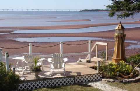 muskoka chairs by the water