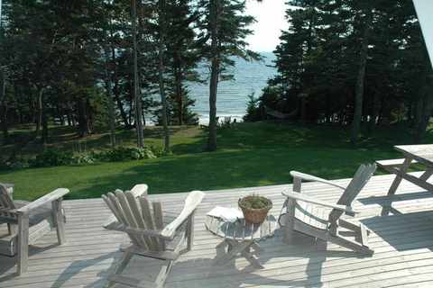 muskoka chairs by the ocean